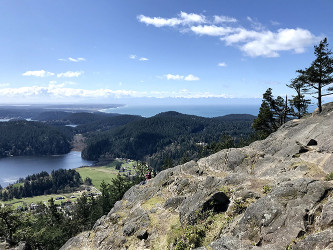 The rewarding view atop Mount Erie toward the Strait of Juan de Fuca and the Olympics