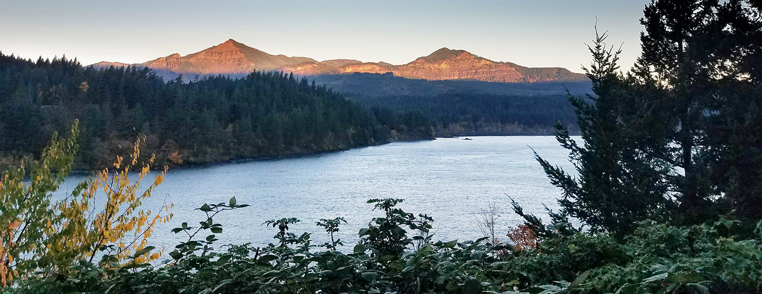 The Cascade landslide complex headscarps seen on Table Mountain and Greenleaf Peak. The Bonneville landslide deposit is in the foreground (across the river)