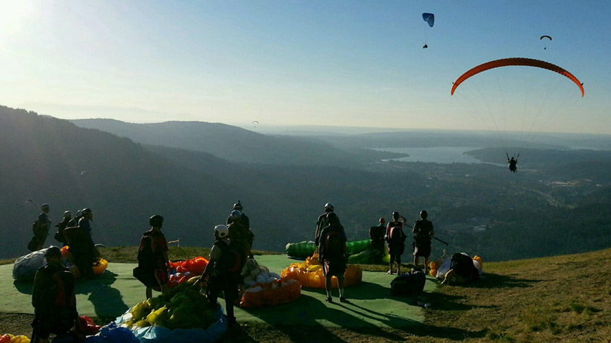 Paragliders get ready to launch from Poo Poo Point