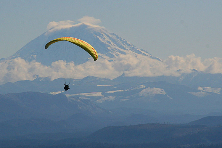 Paraglider enjoying the views of Mount Rainier